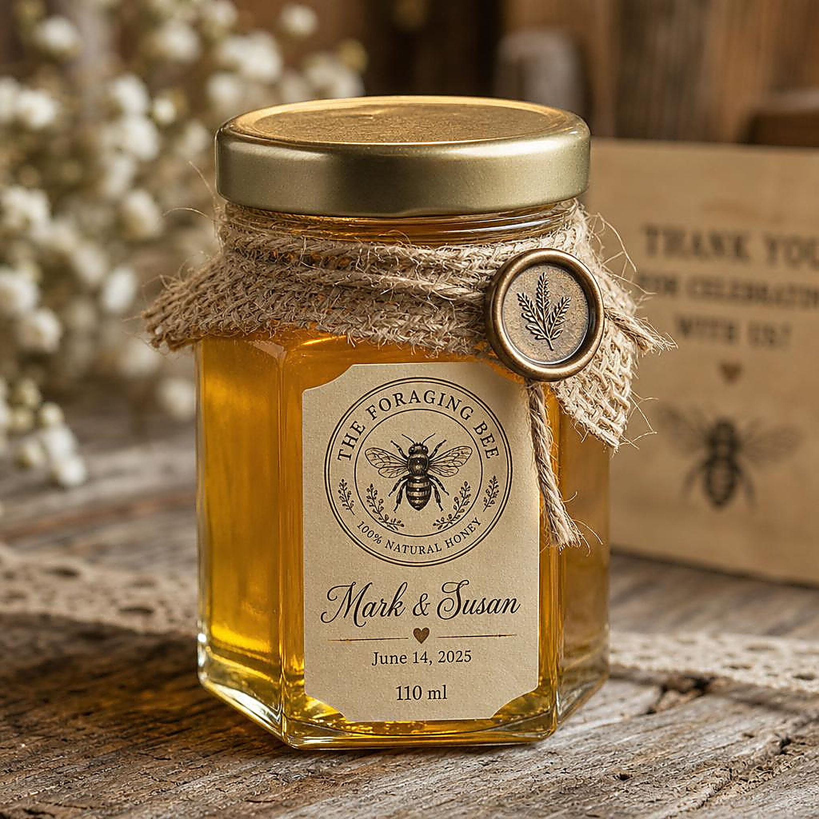 Close-up of a 110 ml hex honey jar with burlap and twine